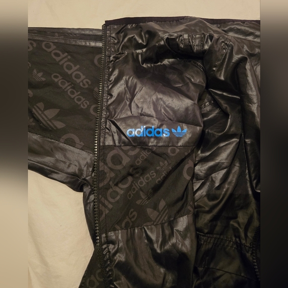 NWOT: Adidas Black Allover Logo Windbreaker Jacket - Size: Large; Black (w/Blue) - Picture 12 of 16